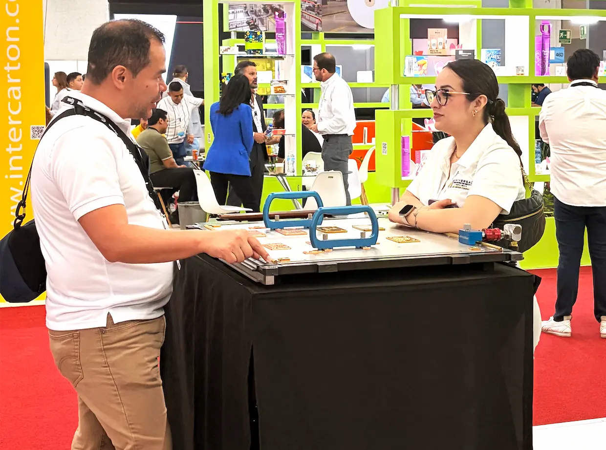 Man asking a staff about product details